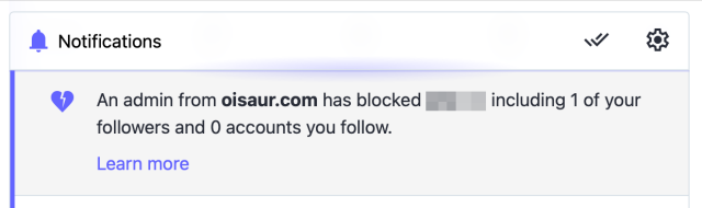 Screenshot of a Mastodon notification saying “An admin from oisaur.com has blocked XXX including 1 of your followers and 0 accounts you follow.”, with a “Learn more” link