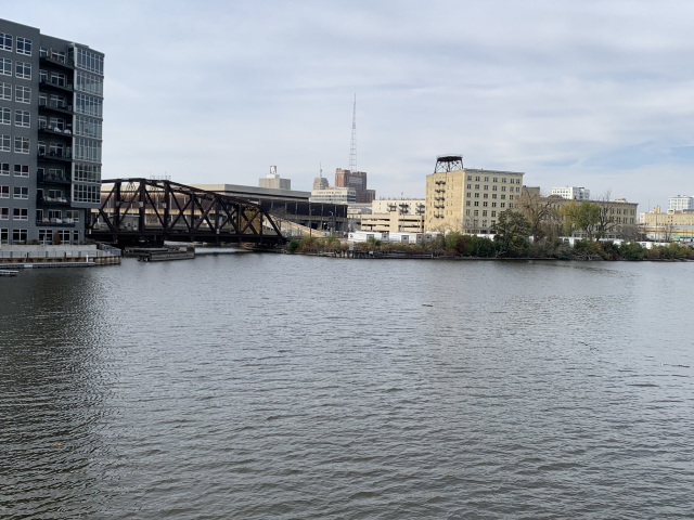 Iron railroad bridge by Milwaukee river