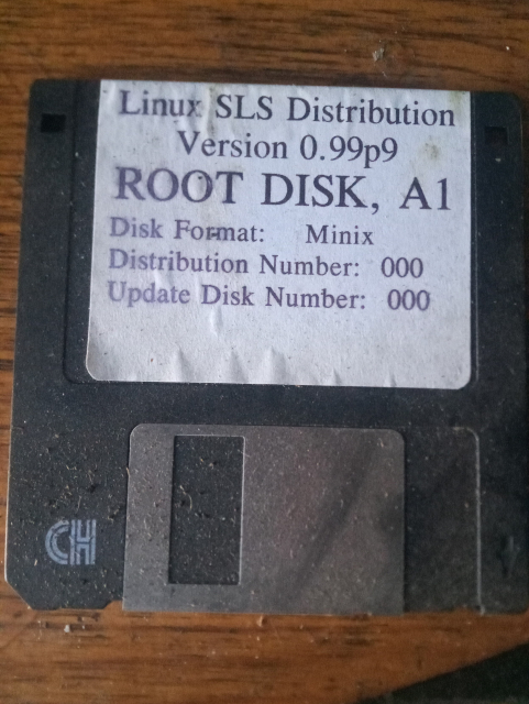 A 3.5" "floppy" disk labelled 

Linux SLS Distribution 
Version 0.99pl9
ROOT DISK, A1
Disk format: Minix
Distribution Number: 000
Update Disk Number: 000