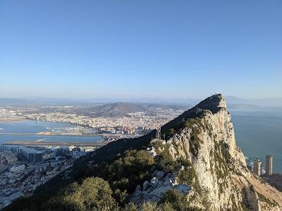 A view of the Rock of Gibraltar, with the airport's landing strip behind, and Spain in the distance