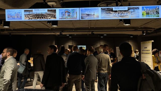 Attendees networking in the foyer area during Nextcloud Enterprise Day.