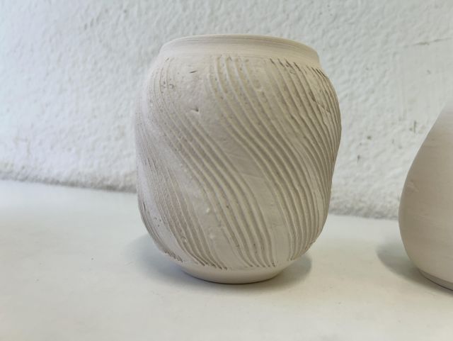 Spiral scored white bisque vase
