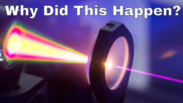 Thumbnail of the video from YouTube. It shows a laser hitting a lens with a text on top that reads "Why did this happen?"